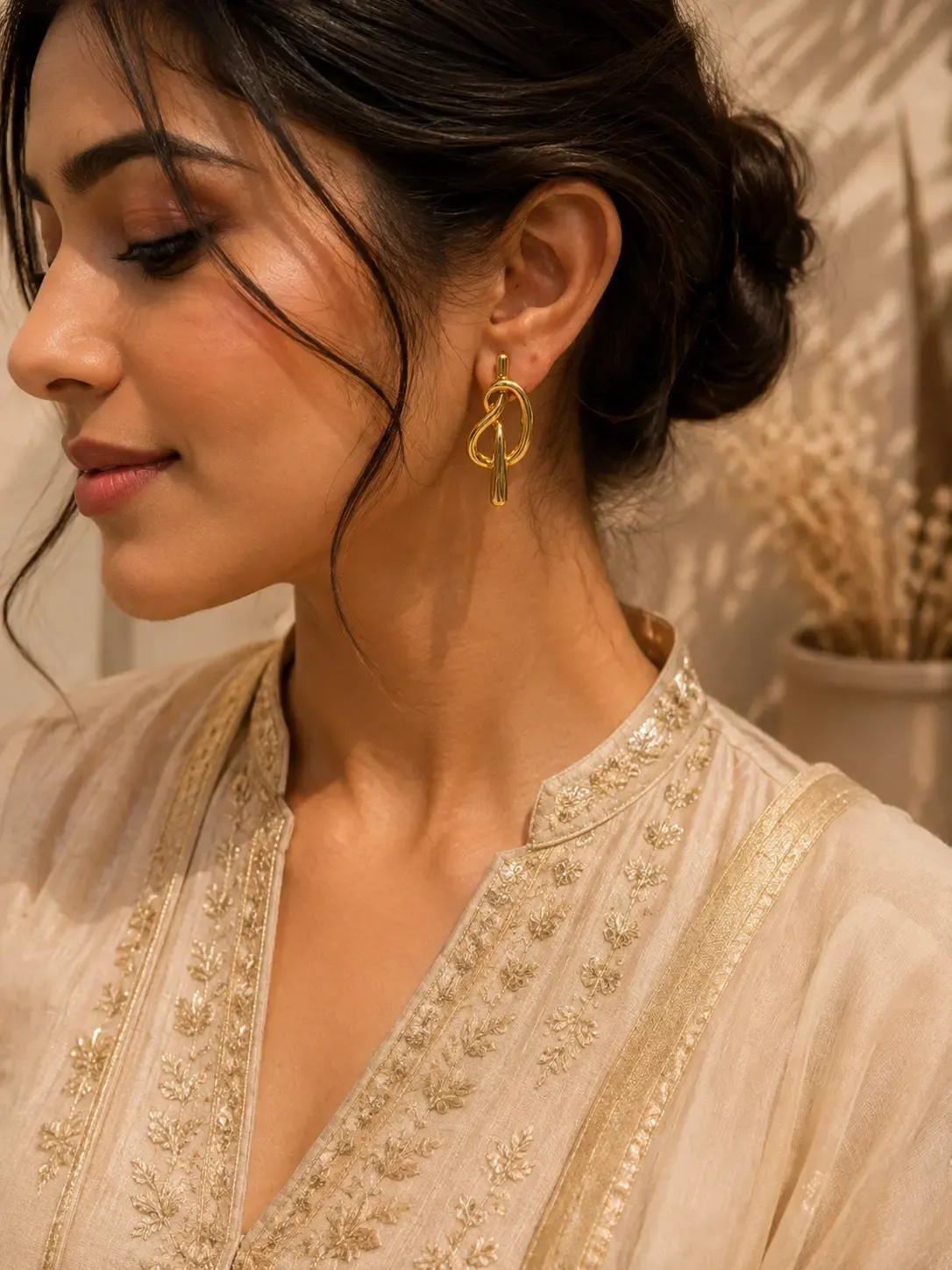 Keyura Sculpted Gold Contour Earrings for Women