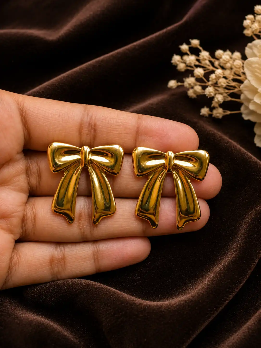 Keyura Polished Bow Knot Gold Stud Earrings for Women