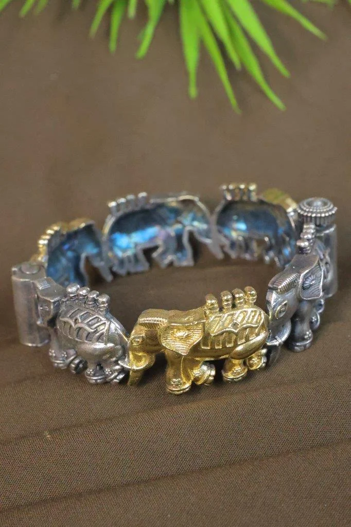 Dual-Tone Elephant Parade Kada with Linked Silver and Gold Elephants