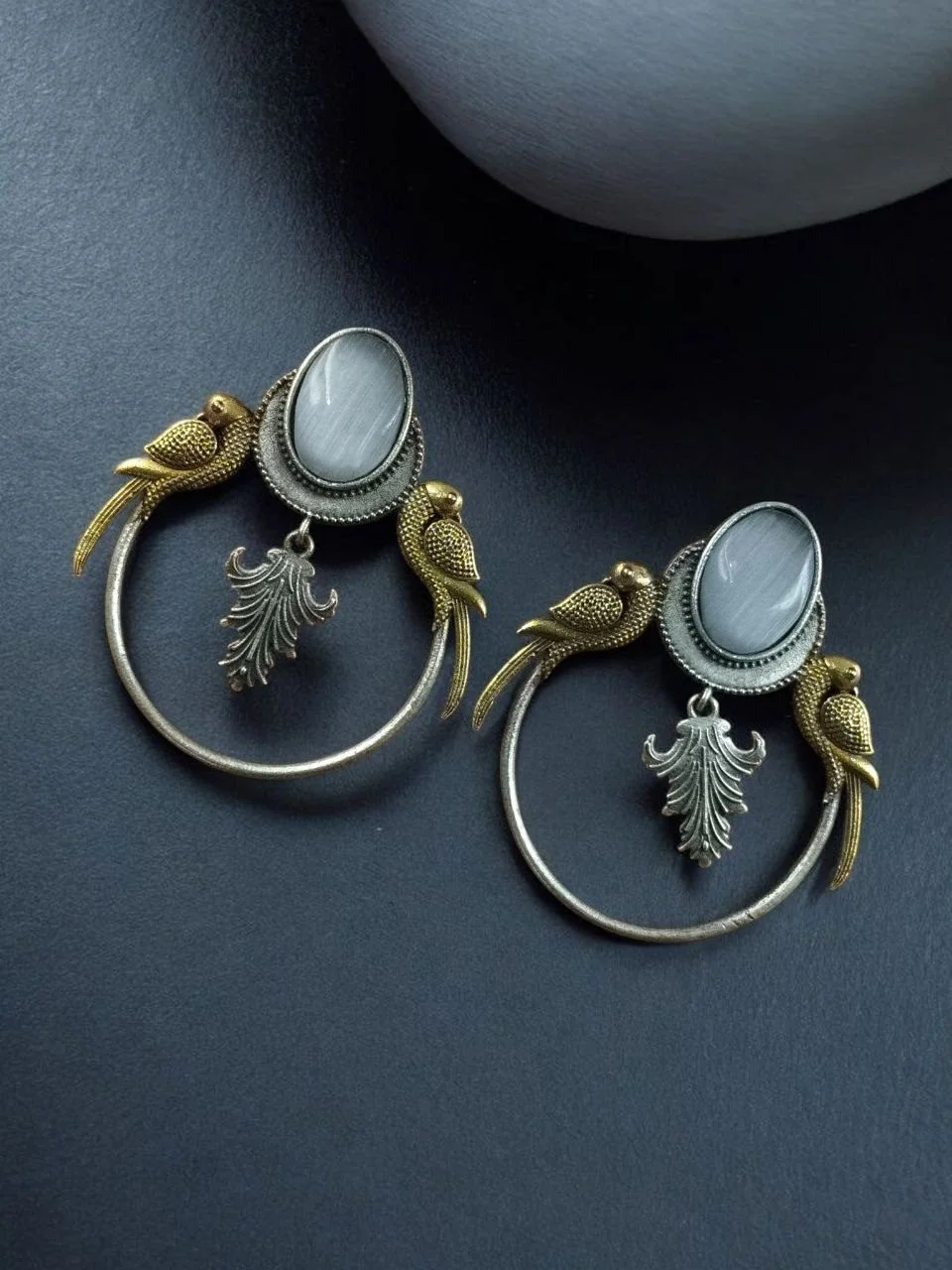 Two-Tone Parrot Hoop Earrings with Oval Stone and Leaf Charm
