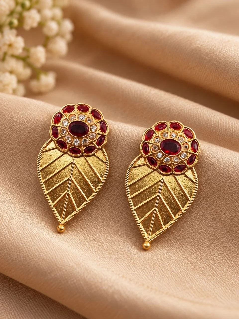 Gold Plated Peepal Leaf Stud Earrings with Red Stone Flower Top