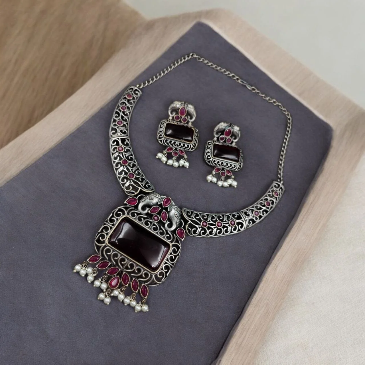 Oxidised Elephant Hasli Necklace Set with Stone Centre