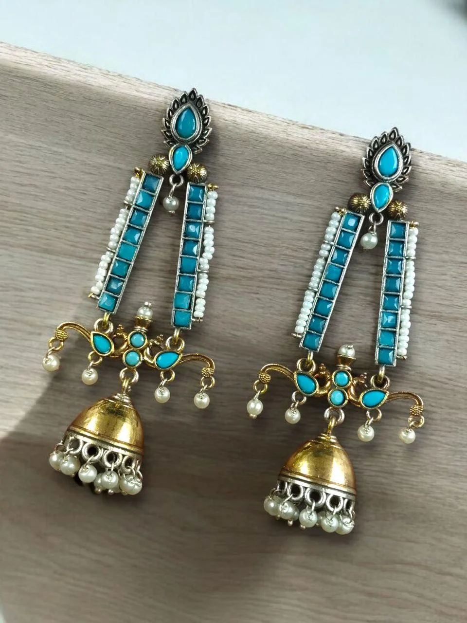 Two-Tone Long Jhumki Earrings with Stone Columns and Pearl Rows