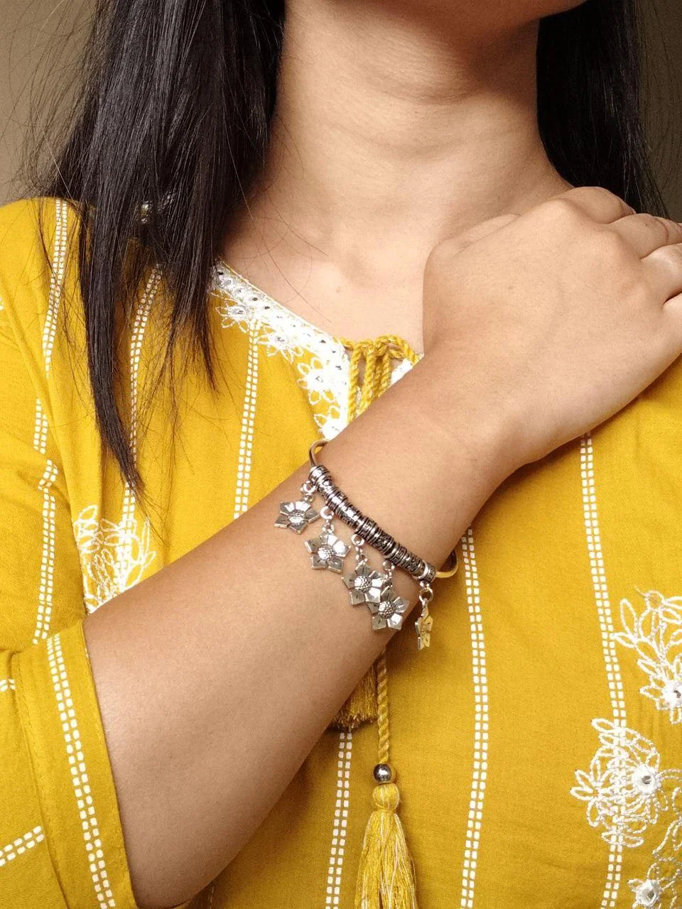 German Silver Open Bangle with Five Flower Charms and Greek-Key Beads
