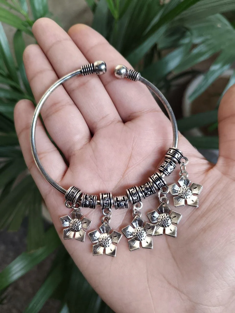 German Silver Open Bangle with Five Flower Charms and Greek-Key Beads – view 3