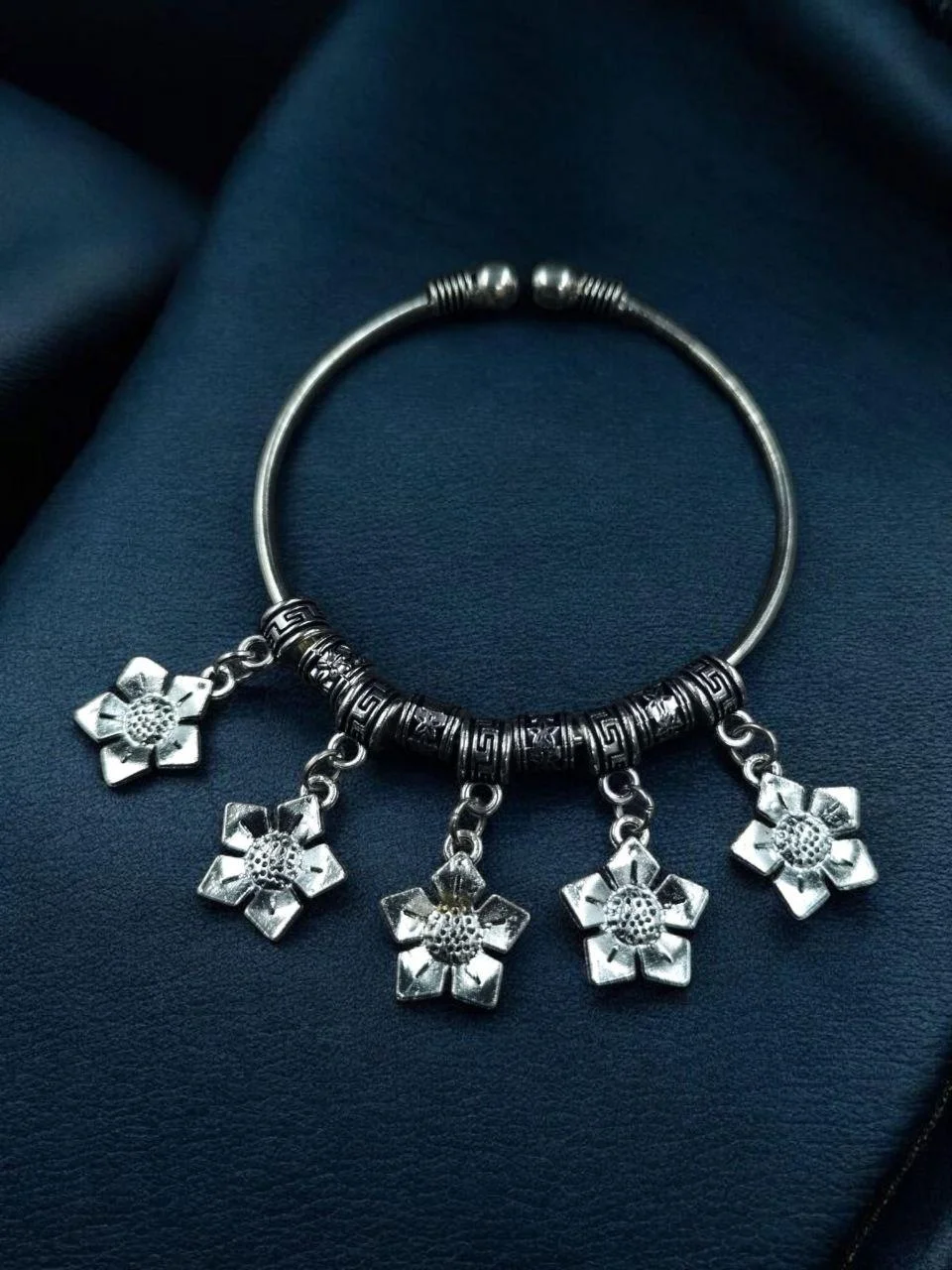 German Silver Open Bangle with Five Flower Charms and Greek-Key Beads – view 2
