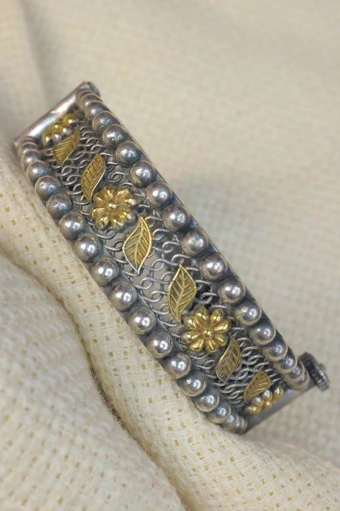 Dual-Tone Golden Leaf and Daisy Mesh Kada with Silver Bead Rows