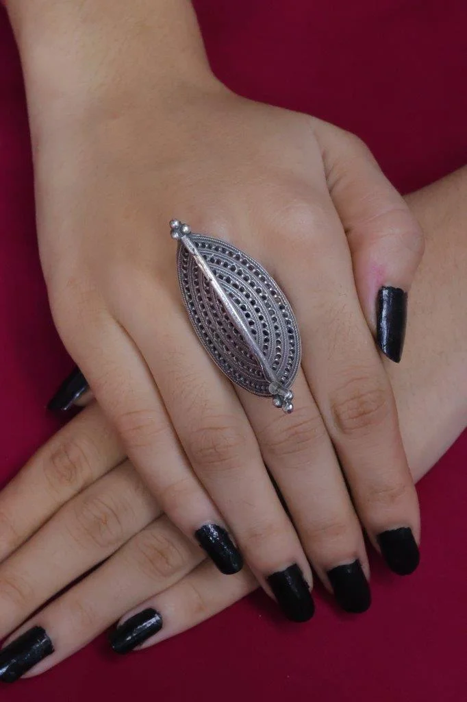 Hatched Leaf Ring Worn Along the Finger